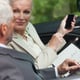 Business people talking together in classy cabriolet