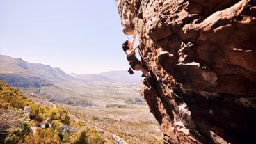 Sports rock climbing and adventure with woman on mountain for fitness health or challenge Explore workout and hiking with person training on cliff in nature for travel freedom or exercise mockup