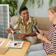 Business couple discussing wind turbine