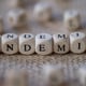 endemic word concept on wooden cubes blocks on burlap background