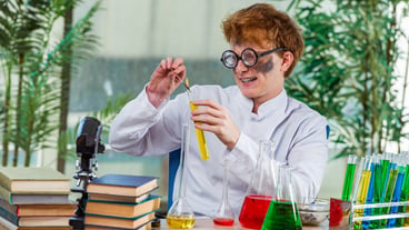 Crazy young chemist working in the lab