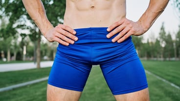 Midsection of man standing in park
