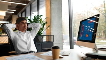 Person in the office analyzing and checking finance graphs