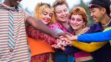 Group of teenagers of different ethnicities conjuring