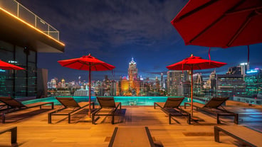 swimming pool and roof top bar on hotel deck in Bangkok city Thailand on 6Aug2020