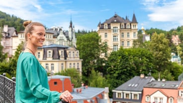 Woman enjoying view of Karlovy Vary from the panoramic terrace