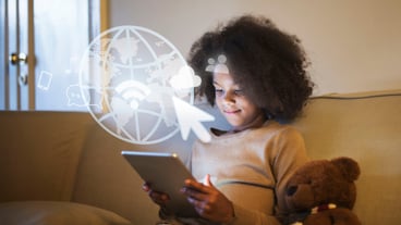 Young black girl using a digital tablet