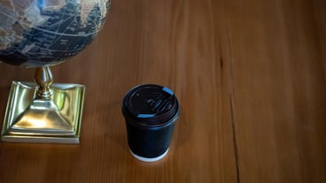 High angle view of cup coffee on table