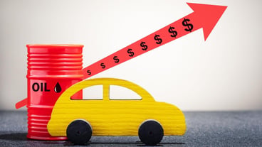 Model of a car oil drum with graphical increase in fuel price