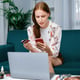 Young happy woman buy product by online shopping with utmost security