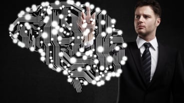 Businessman presses circuit board