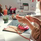 Creative girl has very interesting hobby - she creating jewellery from beads and stones.