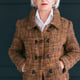 Trendy senior wardrobe. Female style and elegance. Aged lady posing in fashion tweed autumn outfit with hands in pockets.