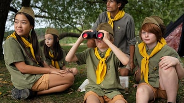 Front view scouts with binoculars