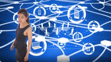 Asian businesswoman walking against glowing dots connected with lines