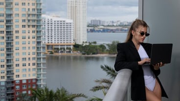 Sexy confident business woman wearing a fashion business outfit suit young female director startup b