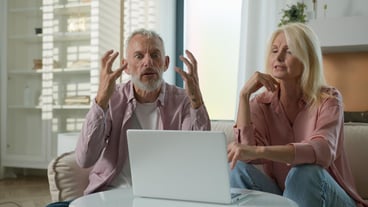 Elderly senior family caucasian couple mature woman man grandparents having emotional discussion