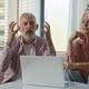 Elderly senior family caucasian couple mature woman man grandparents having emotional discussion