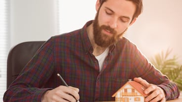 Hipster businessman applying for a mortgage