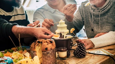 Close up of people enjoying christmas dinner at home
