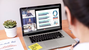 Businessman and businesswoman analysis financial chart with videoconference online meeting.