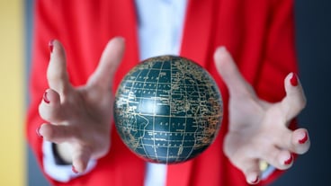Female hands fix the ball with magic. Magic and trickery in the modern world concept
