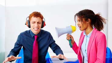 African business woman talking in megaphone