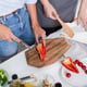 A top view of two women preparing food together