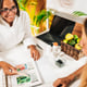 Nutritionist and Client Discussing Balanced Nutrition Plan