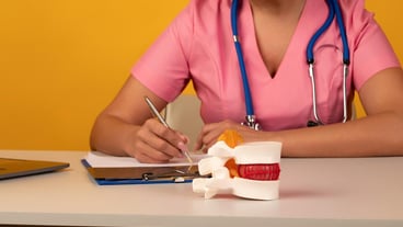 Anatomical lumbar disc herniation model on work desk of doctor in medical clinic Intervertebral hernia treatment