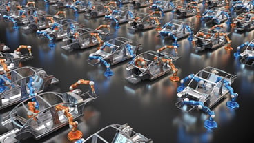 Portrait view of machines and car parts in a workshop