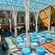 Elegant Event Space with Natural Light and Round Tables in Indianapolis