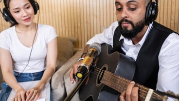 Front view of a woman and a man living on the radio