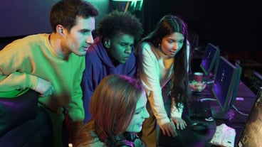 Medium shot of players watching a colleague play