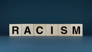 Racism Cubes form the word Racism