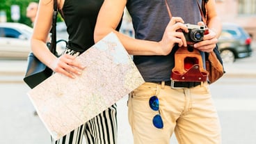 Tourist couple with map