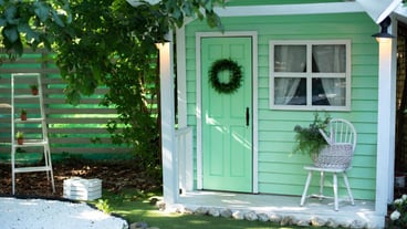 Outdoor wooden porch with garden and garden furniture