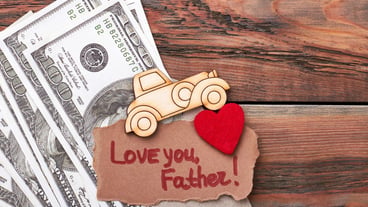 Money, pyrography car, greeting card. Fabric heart on envelope. Life is motion.