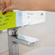 Young woman reminding to save water