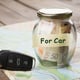 Car finance concept money glass with word For car