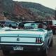 a blue car with a license plate that says quot license plate quot