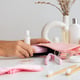 Side view of hands holding products