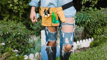 Crop woman with waist tool bag