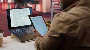 Corporate owner drafting architectural sketches for a new office