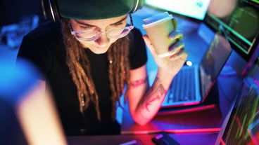 Coffee computer or girl hacker in night office for coding phishing or researching blockchain tech Pc data programmer or woman hacking online in digital cybersecurity on global website or internet