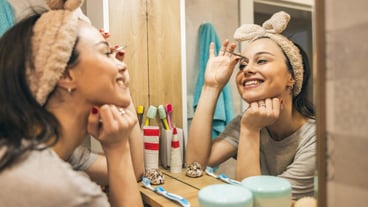 Woman Plucking Eyebrows