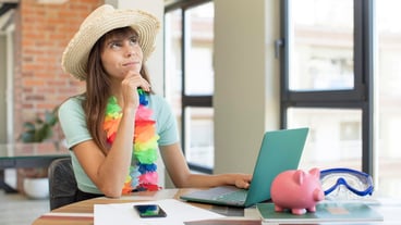 Young pretty woman smiling with a happy, confident expression on her face and her hand on her chin. Travel and vacation concept