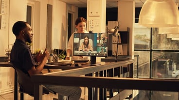Employee talking to colleagues on remote videocall conference, using webcam and computer to attend online videoconference meeting. Doing collaboration on teleconference.