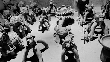 High angle view of statues for sale at street market