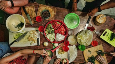 People preparing food in restaurant